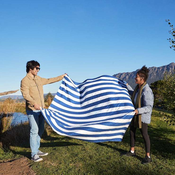 Blue and white striped picnic online blanket